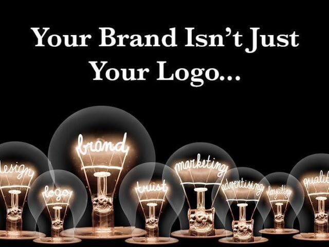 Photo of light bulbs with shining fibres in shape of BRAND concept related words isolated on black background